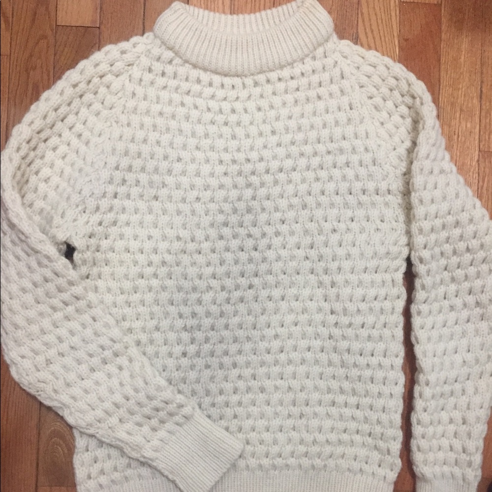 White fisherman’s sweater